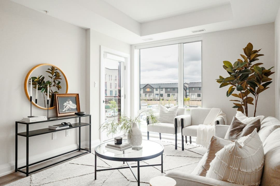 Modern living room with minimalist decor and large window
